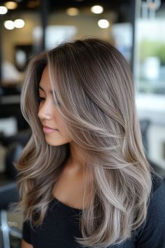 25 Ashy Light Brown Hair Trends That'll Make You Swoon Light Brown Natural Highlights, Hair Dye Ideas Two Tone, Light Gray Hair Color Ash Brown, Ash Brown Ash Blonde Balayage, Ashy Burnett, Milky Brown Highlights, Ash Beige Highlights On Brown Hair, Mushroom Blonde Highlights On Brown Hair, Lived In Light Brown Balayage