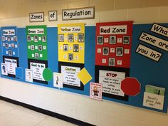 a bulletin board with different signs on it in a school hallway or classroom room that says, what zone are you in?