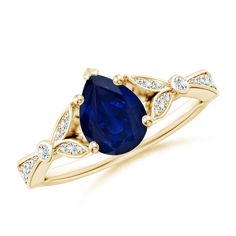 Make your relationship official with this nature-inspired engagement ring featuring a pear-shaped blue sapphire. The gem is secured in a prong setting on a lustrous shank lined with diamond accents. For added charm, the sides of this 14k yellow gold ring are decorated with leaf motifs adorned with pave-set diamonds. Nature Inspired Engagement Ring, Blue Sapphire Engagement Ring, Sapphire Engagement Ring Blue, 14k Rose Gold Ring, Sapphire Engagement Ring, 18k Yellow Gold Ring, Blue Sapphire Rings, Sapphire Engagement, Yellow Gold Ring