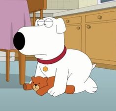 a cartoon dog sitting on the floor with a teddy bear in front of him,