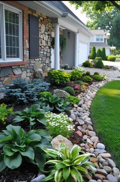 a house with landscaping in front of it