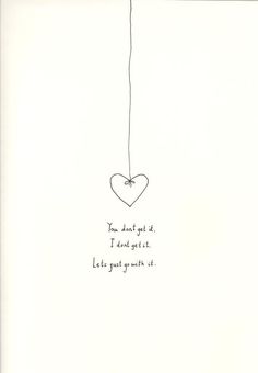 a drawing of a heart hanging from a string with the words you don't get it