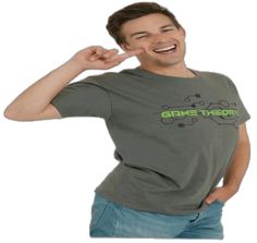 a man is smiling and pointing to his right with the word gameboy on it