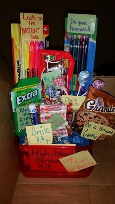 a red basket filled with lots of school supplies