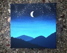 an acrylic painting of the night sky with mountains in the foreground and a half moon