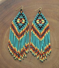 Southwest beaded earrings Southwest Bedazzle jewelz Navajo Wedding, Seed Bead Fringe Earrings, Bead Fringe Earrings, Aztec Earrings, Seed Bead Jewelry Patterns, Cowhide Handbags, Bead Fringe, Beaded Fringe, Seed Bead Earrings