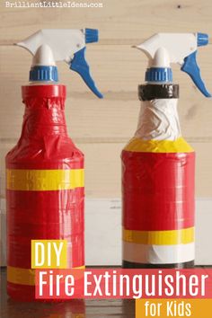 two red and yellow fire extinguisher bottles with blue sprayers on top