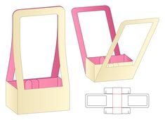 an open cardboard box with pink handles