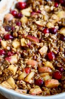 an apple cranberry baked oatmeal in a white dish