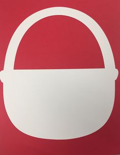 a red and white sign with a basket on it