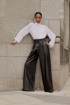 An Elevated Take On Classic Tailored Pants, This Piece Can Be Styled From Fall To Winter With Ease. A High Waisted Design Cinches The Waist With Sumptuous Faux Leather That Falls To The Floor For A Long Length Contemporary Style, While A Wide Leg Style Adds Unmatched Comfort. Pair With A Simplistic Blouse For A Sleek Ensemble From Workwear To Smart Occasions.Faux Leatherwide Leg Stylehigh Waistpocket Detail Wide Leg Cropped Leather Pants Outfit, Chic Wide-leg Leather Pants For Workwear, Chic Wide-leg Leather Pants For Formal Occasions, Chic Leather Pants For Spring Evenings, Formal High Waist Wide Leg Pants For Fall, Formal High-waisted Leather Pants For Spring, Formal Leather Trousers For Spring, Chic Formal Leather Pants For Spring, Elegant Formal Wide-leg Leather Pants