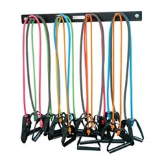 a bunch of different colored cords hanging from a hook on a white background with clippings