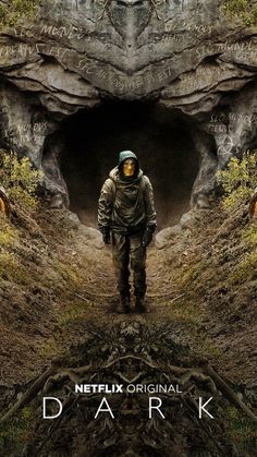 a movie poster with a man walking through a dark tunnel in the middle of nowhere