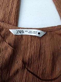 Zara Size Small Women's Cropped Top Brand: Zara Size: SDepartment: Women Style: Cropped Type: TopColor: BrownPattern: Solid Condition: Good Condition. MeasurementsShoulders: 13 inChest-Armpit: 29 inWaist: 24 inSleeve: 18 inLength: 18 in Brown Zara Blouse For Summer, Belt Jewelry, Jewelry Show, Cropped Top, Active Wear Tops, Zara Women, Women Style, Plus Size Tops, Active Wear For Women