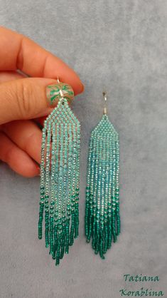 These handmade earrings are made of high-quality Czech beads and strong synthetic thread. They are elegant, fashionable, and highly versatile, suitable for everyday wear. Color: turquoise, emerald, teal . 100% hand made with love! Measurements: Length-about 11.5cm (4.33 inch) Width -about 2 cm (0.79 inch) Materials: Sterling silver components Czech glass beads Nylon Thread Green Drop Tassel Earrings For Beach, Turquoise Jewelry With Tassels And Round Beads, Green Tassel Drop Earrings For Beach, Beaded Fringe Dangle Jewelry For Beach, Green Beaded Long Drop Jewelry, Adjustable Green Jewelry With Tassels, Beach Dangle Jewelry With Beaded Fringe, Green Tassel Jewelry For Summer, Green Dangle Jewelry For The Beach