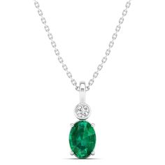 14K White Gold Classic Oval Emerald Birthstone Necklace, Classic Oval Emerald Necklace For May Birthstone, Oval Emerald Necklace With 17 Jewels, Elegant Emerald Oval Pendant Necklace, Classic Oval Green Emerald Necklace, Classic Green Oval Emerald Necklace, Elegant Oval Emerald Necklace With Bezel Setting, Elegant Oval Emerald Pendant Necklace, Elegant Oval Pendant Emerald Necklace