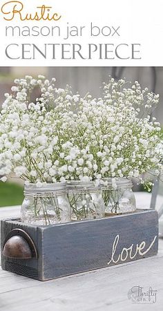 mason jar box centerpiece with love written on it