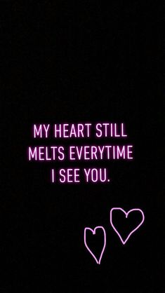 two neon hearts in the dark with text that reads, my heart still melts every time i see you