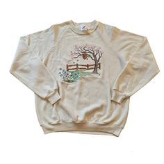 Vintage 90's Embroidered Grannycore Crewneck Sweatshirt. Size: XL Brand: JerZees Made in: USA Cute embroidered design of a tree with a bee's nest hanging off of it. Material: 50/50 cotton/ polyester Measurements Taken Laying Flat: double where necessary) Also noted in pictures Length: 26" **Chest: 22.5" **Waist:16" Condition: Good used vintage condition. No stains, holes, frays, or repairs. Some thinning from being 30+ years old. *Please examine all photos and ask questions before buying the ite Vintage Crew Neck Sweater With Embroidered Graphics, Retro Embroidered Crew Neck Sweater, Vintage Embroidered Crew Neck Sweatshirt, Vintage Embroidered Crew Neck Sweater, Vintage Embroidered Long Sleeve Sweatshirt, Retro Embroidered Cotton Sweater, Vintage Long-sleeved Embroidered Sweatshirt, Retro Cotton Embroidered Sweater, Cottagecore Cotton Crew Neck Sweatshirt