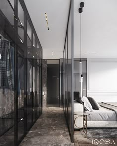 a bedroom with black glass walls and a white bed in the corner next to it