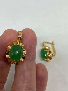 Vintage nephrite Jade golden bronze earrings These earrings are about a half an inch long All jewelry is shipped free in the US in a nice gift box. Check out our over a THOUSAND great reviews Green Lever Back Earrings As A Gift, Green Round Clip-on Earrings For Gift, Green Round Clip-on Earrings As Gift, Oval Jade Earrings For Gift, Green Oval Earrings As Gift, Green Oval Earrings For Gift, Oval Clip-on Earrings For Gift, Gold Jade Earrings, Bronze Earrings