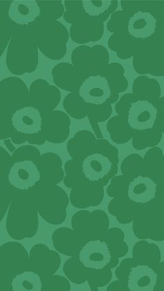 a green background with white flowers on it