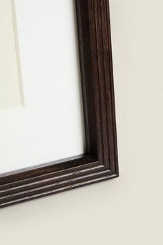 a framed photograph hanging on the wall