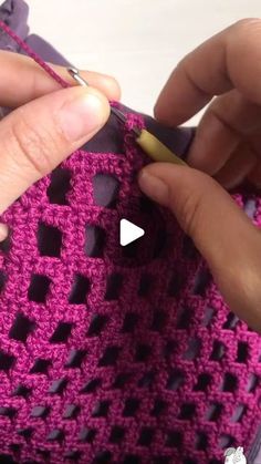 someone is crocheting the bottom part of a purse