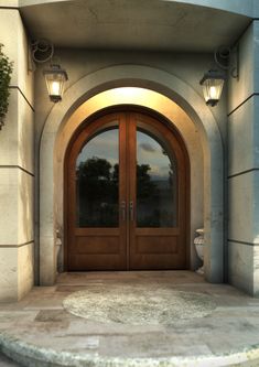 an entrance to a building with two double doors and one light on the outside wall