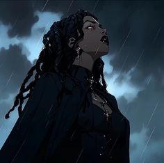 a woman with dreadlocks standing in the rain looking up at something behind her