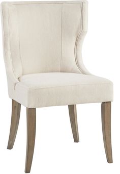 a white upholstered chair with wood legs