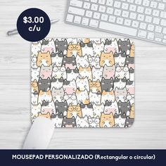 mouse pad with cats pattern on it and keyboard next to the mousepad is $ 3 00