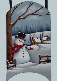 a snowman with a red scarf and hat standing next to a tree