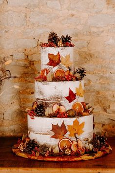 Three tier wedding cake with white frosting and autumnal leaf decorations Pumpkin Pie Wedding Cake, Autumn Cake Decorating, October Wedding Cake, October Cake, Wedding Cake Fall, Cake Sauce, Fall Cake Toppers, Autumn Wedding Cake