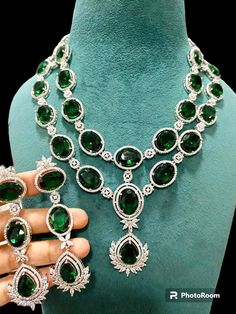 Exclusive Collection of Sabyasachi inspired Emerald green AD designer necklace set. Silver plated.  If have any queries please ask. Luxury Green Round Bridal Necklace, Green Temple Jewelry Sets For Formal Occasions, Heavy Green Jewelry Sets For Party, Green Emerald Temple Jewelry Necklace For Formal Occasions, Luxury Green Jewelry For Festive Occasion, Green Temple Jewelry With Jewels, Green Costume Jewelry Sets, Green Jeweled Kundan Necklace For Formal Occasions, Formal Green Kundan Necklace With Jewels