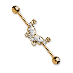 a gold plated belly bar with an ornate design and crystal stones on the end