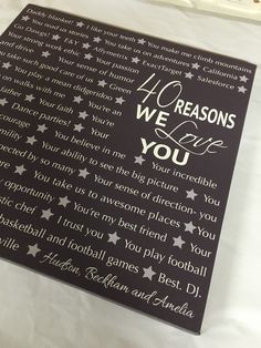 a black box with white stars on it that says 40 reasones we love you