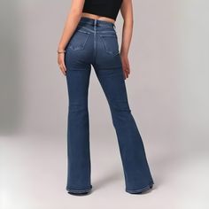 FLARE UP YOUR STYLE WITH HIGH RISE STRETCH JEAN! A Timeless Style : Flared Jean✨ Embrace a timeless style that effortlessly combines retro vibes with modern trends. Our high-rise flared jeans are designed to flatter your figure and elongate your legs. With our '70s-inspired washes and finishes, you can achieve a vintage look that never goes out of style. Slimming Fit On-trend High Rise Flare Jeans have the ideal slimming fit — offers a flattering silhouette from the waist down in a full-length f Trendy Full-length Flares For Fall, Trendy Full-length Fall Flares, Trendy Full Length Flares For Fall, Trendy Full Length Fall Flares, Trendy Dark Wash Flared Hem Flares, Trendy Dark Wash Flares With Flared Hem, Trendy Non-stretch Flare Jeans With Flared Hem, Trendy Non-stretch Wide Leg Flares, Stretch High Rise Retro Flare Jeans