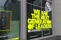 there is a sign in the window that says we are the next generation of leaders