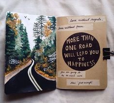 an open notebook with the words, more than one road will lead you to happiness