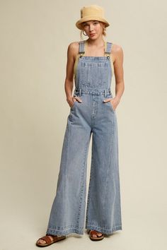 - Denim overalls with wide opening bottoms - Adjustable shoulder strap with buckle closure on front - Pouch pocket on bust front - Belt loop on waistband - Side pockets on bottom pants - Back pockets on back bottom - Finished with washed out detailing with raw edge on hem - Model is 5' 10" 33-24-35 and wearing a size Small Fabric Contents 100% cotton Denim Flares, Denim Overalls, Wide Leg Denim, Covet Fashion, Raw Edge, Spring Summer Fashion, Black Denim, Fashion Boutique, Jumpsuits For Women