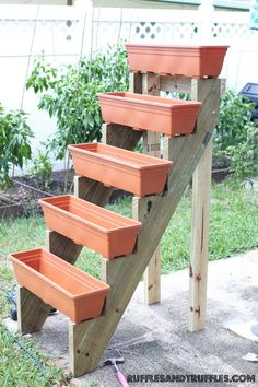 some planters are sitting on the steps outside