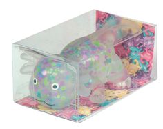 a plastic toy in a clear box filled with lots of different colored toys and decorations