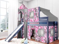 a child's bedroom with bunk beds and slide