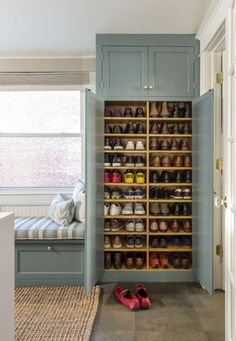 a shoe rack in the corner of a room