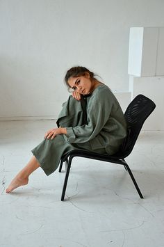 "Moss green loose linen casual top. Handmade linen oversize long sleeve blouse. Height of my model - 170 cm. / size - S Choose size: XS Bust 82 - 84 cm. ( 32 1/4\" - 33\") Waist 66 - 68 cm. / (26\" - 26 3/4\") Hips 90 - 92 cm. / (35 1/2\" - 36 1/4\") S Bust 86 - 88 cm. ( 33 3/4\" - 34 3/4\") Waist 70 - 72 cm. / (27 3/4\" - 28 1/4\") Hips 94 - 96 cm. / (37\" - 37 3/4\") M Bust 90 - 92 cm. ( 35 1/2\" - 36 1/4\") Waist 74 - 76cm. / (29 1/4\" - 30\") Hips 98 - 100 cm. / (38 1/2\" - 39 1/4\") L Bust Linen Pajamas, Loose Top, Linen Casual, Blue Wood, Linen Blouse, Loose Tops, Linen Top, Moss Green, Casual Top