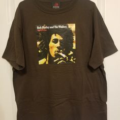 a t - shirt with bob marley and the wains on it