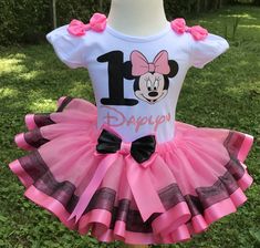 Minnie Mouse Birthday outfit, Personalized Tutu and Shirts, Minnie First Birthday Tutu, Pink and Black Tutu. Thank you for stopping by our shop!  All of our tutus outfit are made when order do to personalization requests. Our tutus can be personalized the way you want it as long it's in our reach.  The design on the shirts are made with professional heated transfer vinyl with a professional heat press. The colors of the design can be change if you choose to. PERSONALIZATION: If you choose to cha Minnie First Birthday, Tutu Minnie, Minnie Mouse Theme Party, Minnie Mouse Birthday Outfit, Minnie Mouse First Birthday, Wonder Woman Birthday, Minnie Mouse Tutu, Minnie Mouse Birthday Cakes, Tutu Pink