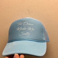 Got the blues? Let the Ocean made Me Salty Trucker Hat show the world you’re proud to be salty! It’s a classic look, with a classic graphic that screams “OMMS” (Ocean Made Me Salty).. So go ahead - show off that salty side and make a splash! Swimwear Store, Beach Beauty, The Blues, One Piece Swim, Hats For Sale, Proud To Be, Go Ahead, Scarf Hairstyles, Accessories Branding