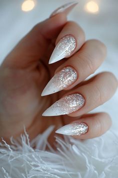 DIY glitter gradient French tips featuring a soft shimmer transition from the tips to the base for an elegant and sparkling nail design. 💅✨ White Frost Nails, New Year Nails Ideas Almond Shape, Ice Inspired Nails, Glitter Ombre Christmas Nails, Fancy Simple Nails, Minimal Xmas Nails, White Witch Nails, Nye Glitter Nails, Sparkling French Tip Nails